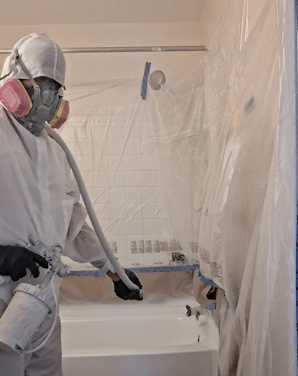 Jim refinishing a bathtub