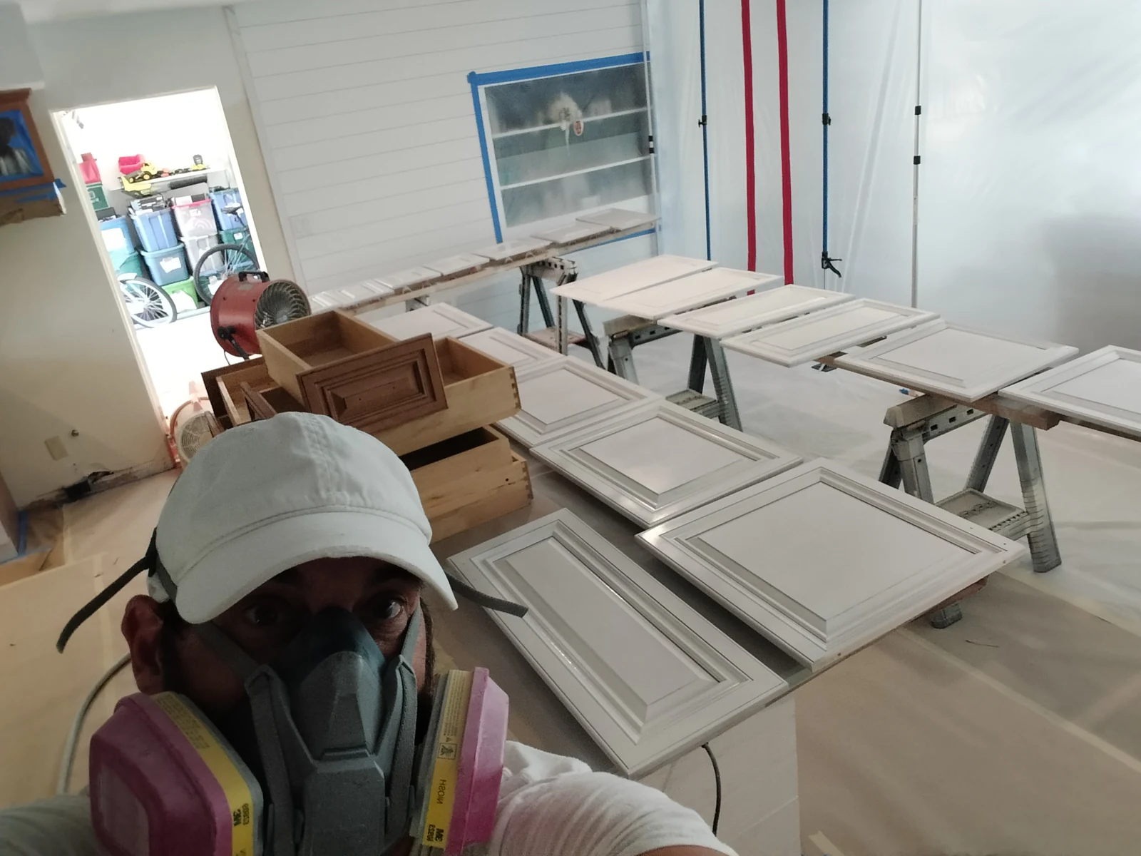 The Felts team refinishing cabinets